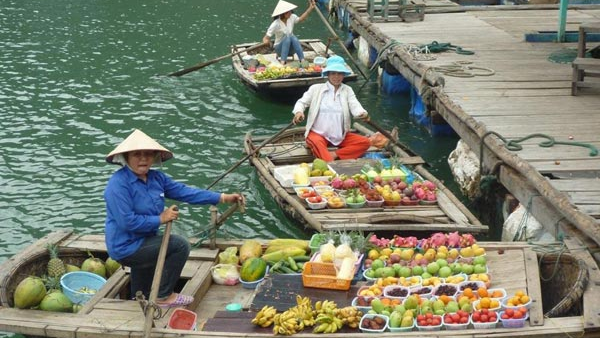 Experience floating market in Ha Long Bay